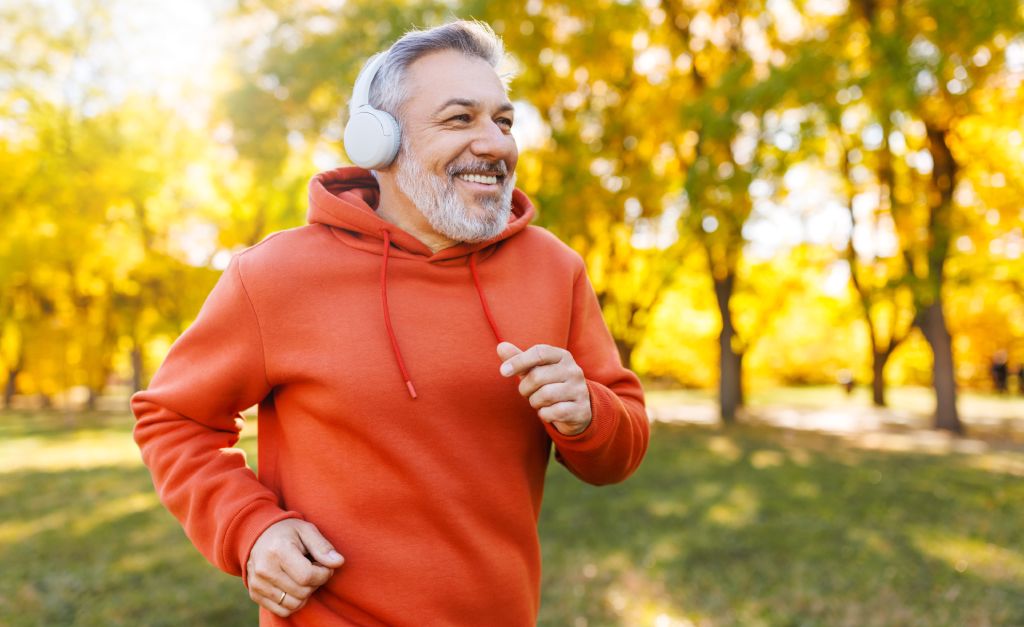 A senior man goes for a run.